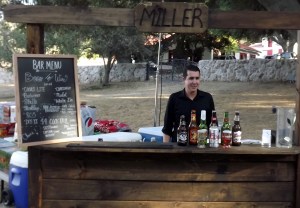 My son waiting for customers at bar