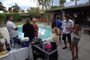 Guests mingle poolside