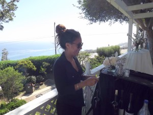 My daughter learns how to open wine