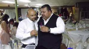 The fathers share a drink