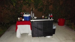 Portable bar and table at holiday party